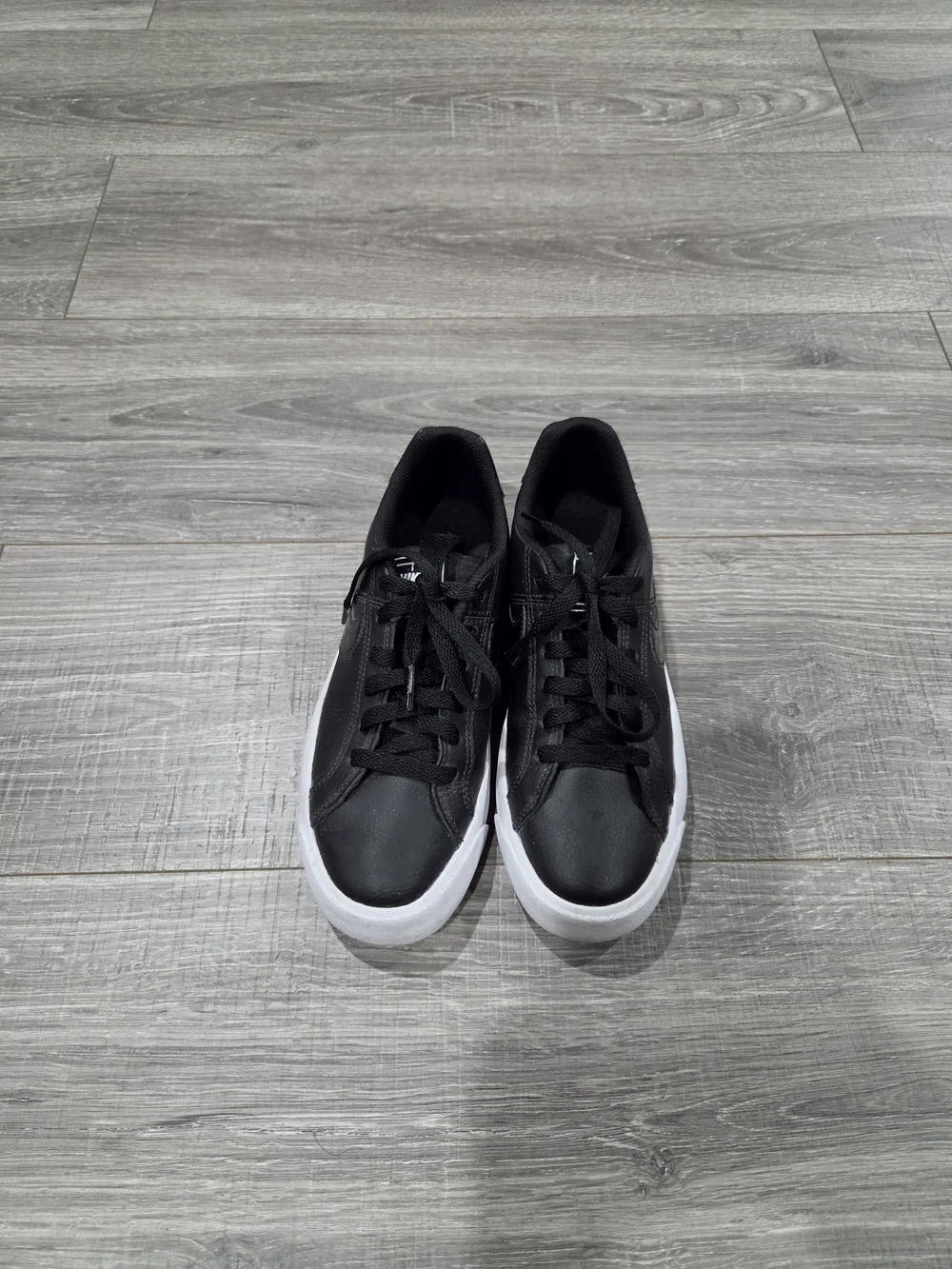 Nike Black Leather Low-Top Sneakers with White Sole